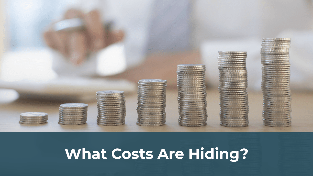 SMB owner reviewing hidden costs to increase profits in 2025
