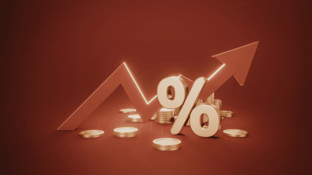 A construction project manager and a fractional CFO reviewing financial charts and blueprints on a tablet at a job site.