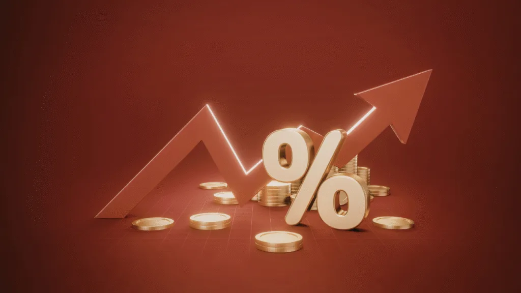 A construction project manager and a fractional CFO reviewing financial charts and blueprints on a tablet at a job site.